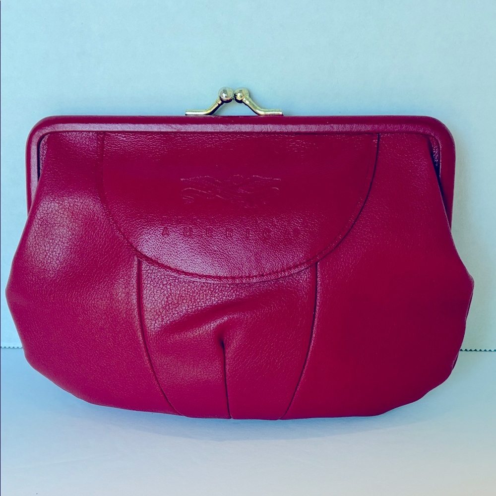 Red leather wallet
Perry Ellis America
7.5” x 5“ x 1“